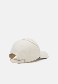 Casquette BOSS CAP-BOLD Beige avec logo imprimé Noir - Disponible chez