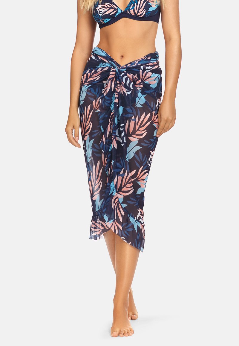 Przezroczysta spódnica o kwiatowym wzorze w granatowym kolorze, z różowymi i turkusowymi liśćmi; związana w talii i z postrzępionym dołem.