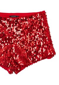 Red sequin shorts featuring a fitted design, covered in shiny sequins of varying shades of red, with a smooth fabric and a side zipper.