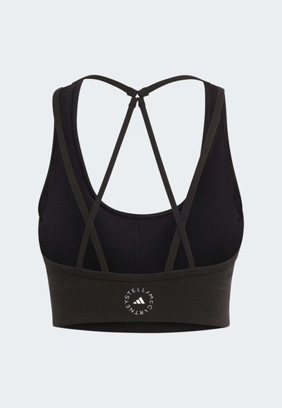 Black sports bra featuring a cross-back design with multiple thin straps. Smooth texture and logo detail at the center back.