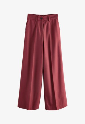 Hoch taillierte, weit geschnittene Culottes in gedämpftem Rot mit Knopf- und Reißverschluss, Gürtelschlaufen und vorderen Falten.