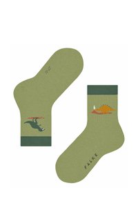 Grüne Socken mit verspielten Dinosauriermotiven: ein T-Rex mit einem Skateboard und ein Stegosaurus mit einem weißen Vogel auf einem roten Fleck.