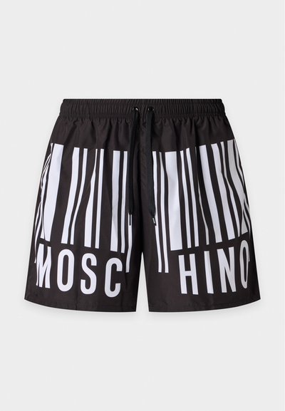 Short de bain noir avec des rayures verticales blanches style code-barres et le mot "MOSCHINO" réparti sur l'avant, avec une taille élastique et un cordon noir.