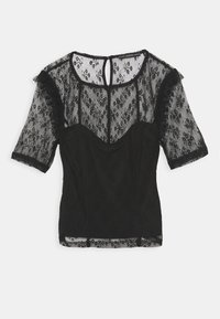 Haut en dentelle noire à manches courtes, présentant un corsage ajusté, un motif floral, des accents froncés et une fermeture au dos avec une ouverture en forme de goutte.