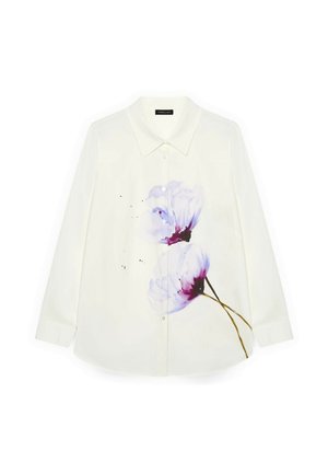 Camisa blanca de manga larga con estampado floral en púrpura, con un cuello clásico y cierre de botones en la parte delantera. Tela suave con un brillo sutil.