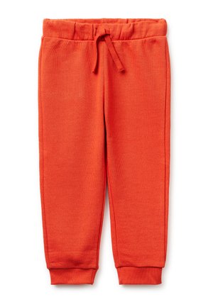 Heldere oranje peuter joggingbroek met elastische tailleband, trekkoord en geribbelde boorden op een witte achtergrond.