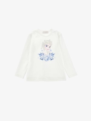 Camicia bianca a maniche lunghe con una grafica di un personaggio con capelli biondi circondato da rose blu e fiocchi di neve. Materiale in morbido cotone.
