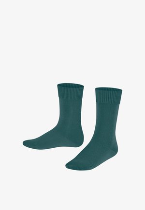 Türkisfarbene Socken mit einer gerippten Bündchen, gefertigt aus einem glatten Strickstoff. Sie haben eine Standard-Länge bis zur Mitte der Wade und eine verstärkte Spitze für erhöhte Haltbarkeit.
