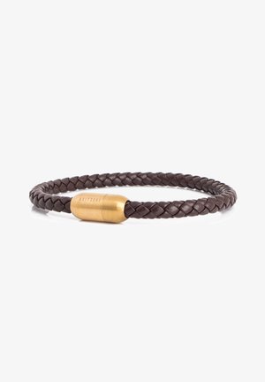 Brown braided leather bracelet featuring a rounded gold-colored metal clasp with engraved details. Smooth texture, flexible design, circular shape.