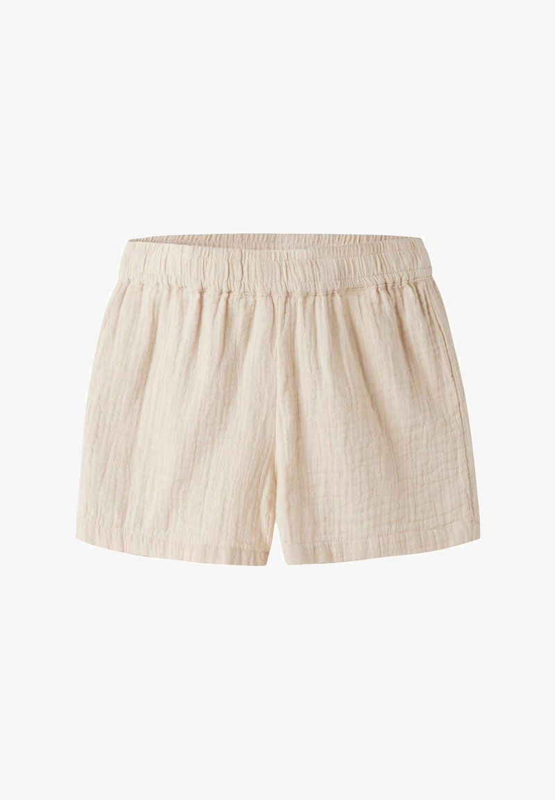 Shorts beige en coton léger avec taille élastique et tissu texturé, conçus pour un confort décontracté.