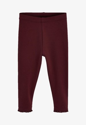 Leggings burdeos fabricados con tejido elástico. Presentan un ajuste ceñido y un borde de encaje en el tobillo. Diseño de cintura sin costuras.