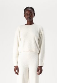 Calvin Klein Underwear PLUSH SWEATSHIRT - Pyžamový vrchný diel - ivory