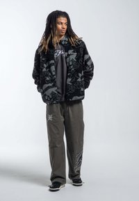 Ed Hardy LOVE KILLS SLOWLY AOP ZIP THRU BORG - Giacca in pile - black