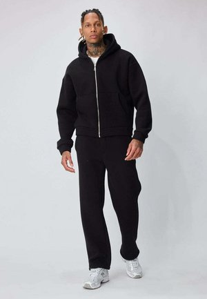 ENSEMBLE JOGGING AVEC POCHES LATÉRALES - Survêtement - noir