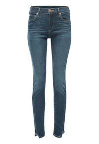 Jean denim bleu coupe slim avec bouton avant, fermeture éclair, poches et détails délavés subtils sur les cuisses et les genoux.