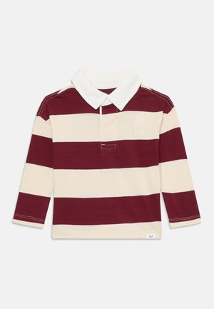 Langermet polo-skjorte med bordeaux og kremfargede horisontale striper, hvit krage og knappestolpe. Myk bomullsstoff med et merke på kanten.