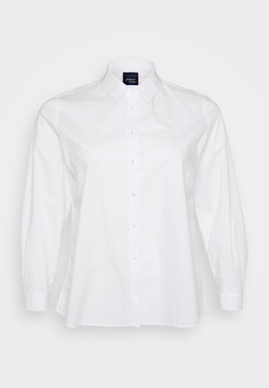 Witte lange mouwen shirt, knoopsluiting aan de voorkant, kraag, gemaakt van katoen. Heeft een zachte textuur en een relaxte pasvorm, met een afgeronde zoom en knoopmanchetten.