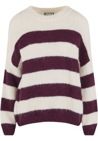 Storas mezgimo megztinis su kreminės ir gilios violetinės spalvos juostelėmis. Turi apvalų iškirptę bei ribėtų rankogalių ir apačią, pasižymi minkšta, pūkuota tekstūra.