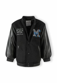 Giacca varsity nera con corpo in lana e maniche in ecopelle. Presenta lettere ricamate, bottoni a pressione e polsini e orlo a coste.