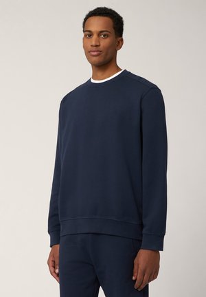 Navyblauwe sweatshirt gemaakt van een katoenmix, voorzien van een ronde hals, geribbelde manchetten en zoom, met een klein logo op de borst, gladde textuur.