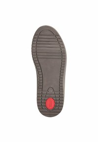 Semelle de chaussure en caoutchouc gris avec des rainures horizontales et verticales pour l'adhérence, dotée d'un accent circulaire rouge portant l'inscription "Confort." Indication de taille présente.