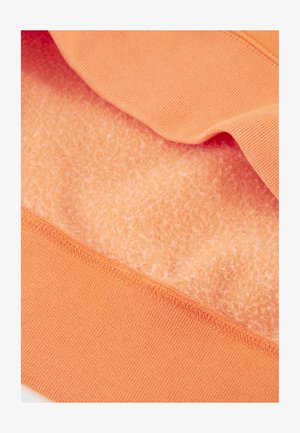 Oranje stof met een zachte, pluizige binnenkant en een gladde buitenlaag. Voorzien van een geribbelde zoomdetail, geschikt voor casual kleding.