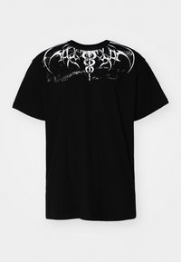 Black cotton t-shirt featuring a white graphic design with intricate patterns across the shoulders. Short sleeves and regular fit.