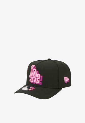 Black cap with a curved brim, featuring a pink embroidered "LA" logo and accent on the side. Made from fabric with a smooth texture.