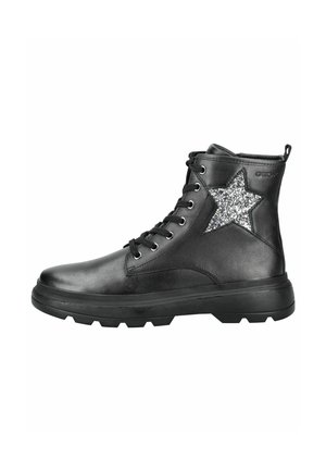 Bottines en cuir noir avec une finition brillante, ornées de détails en étoile en paillettes argentées et dotées d'une semelle en caoutchouc robuste. Lacets avec œillets en métal.