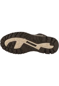Semelle de chaussure en caoutchouc avec des rainures profondes pour une meilleure traction, avec un centre beige et des bords extérieurs noirs. Détail du logo présent près du talon.