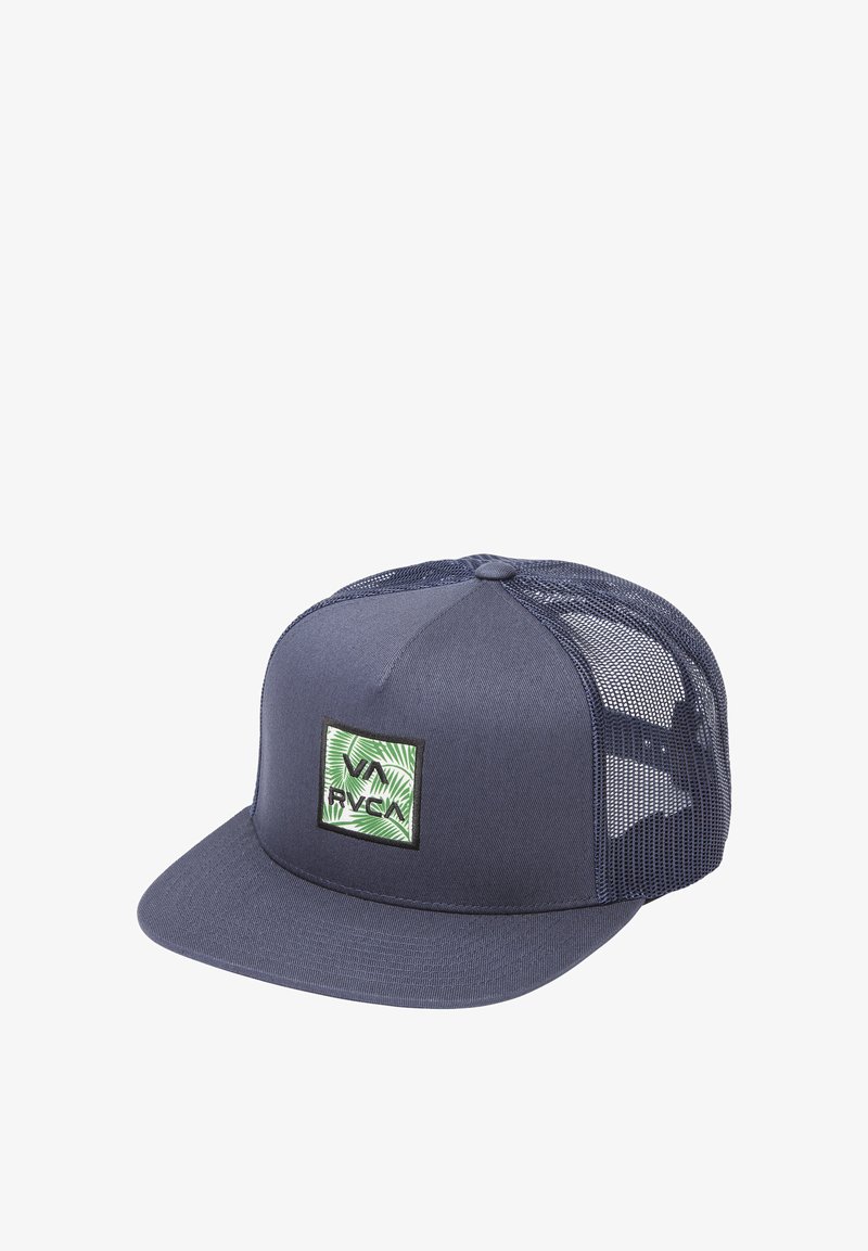 Navy blue baseball cap with mesh back, flat brim, and green patch featuring leaf design and "RVCA" logo. Textured fabric, adjustable closure.