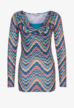 Top de manga larga con patrón de zigzag colorido en azul, naranja, rojo y negro, con un escote drapeado tipo cowl.