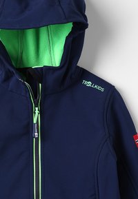 Navy blue children's jacket with green fleece lining. Features a hood, contrasting zipper, and "TROLLKIDS" logo on the shoulder.