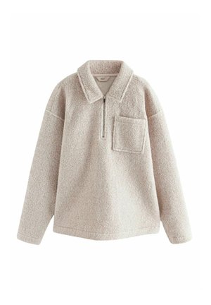 Light beige fleece pullover with a quarter zip, collar, and a front pocket. Textured surface, loose fit, and soft material.