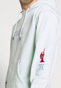 Grimey Mikina s kapucí - light blue