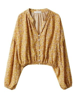 Żółta, kwiatowa bluzka z długim rękawem, zapinana na guziki z przodu, z elastycznym dołem i marszczonymi mankietami.