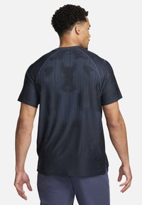 Nike Performance Sports T-shirts - thunder blue black black