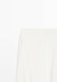 White wide-leg pants with an elastic waistband and side pockets, displayed against a plain white background.