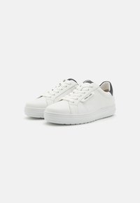 White leather sneakers with a rounded toe, textured surface, and contrasting black accents at the heel. Features lace-up front and flat sole.