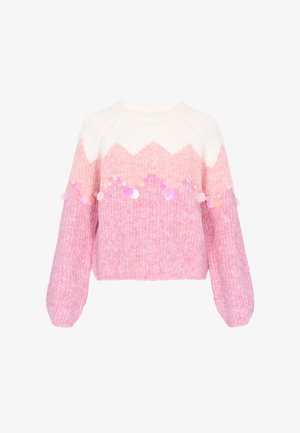 Roze trui met een witte zigzagpatroon aan de bovenkant, met een fluffy textuur en ronde pailletten langs de onderrand.