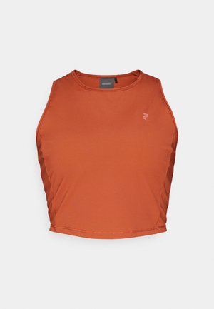 Rust-colored athletic crop top made of smooth, stretchy fabric with a round neckline and a small logo on the chest.