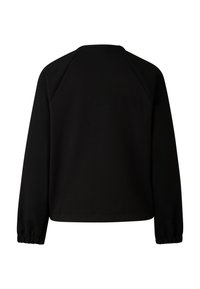 Černá mikina s kulatým výstřihem, raglánovými rukávy, nařasenými lemy a texturovanou látkou. Minimalistický design bez viditelných log nebo vzorů.