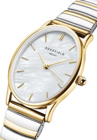 Runde Uhr mit einem Zifferblatt aus weißem Perlmutt, goldfarbenen Indizes und Zeigern, einer goldenen Lünette und einem zwei-farbigen Metallarmband mit polierten Gliedern.