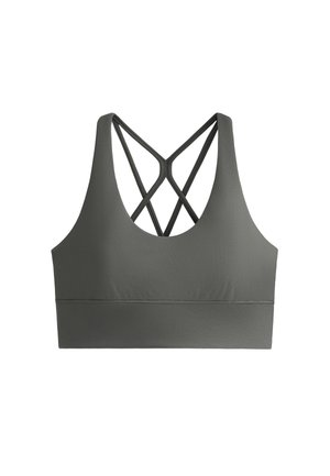 Sportski grudnjak tamno maslinaste boje, napravljen od glatkog materijala. Ima širok pojas i dizajn u obliku križa na leđima. Bez uloška ili žične potporne konstrukcije.