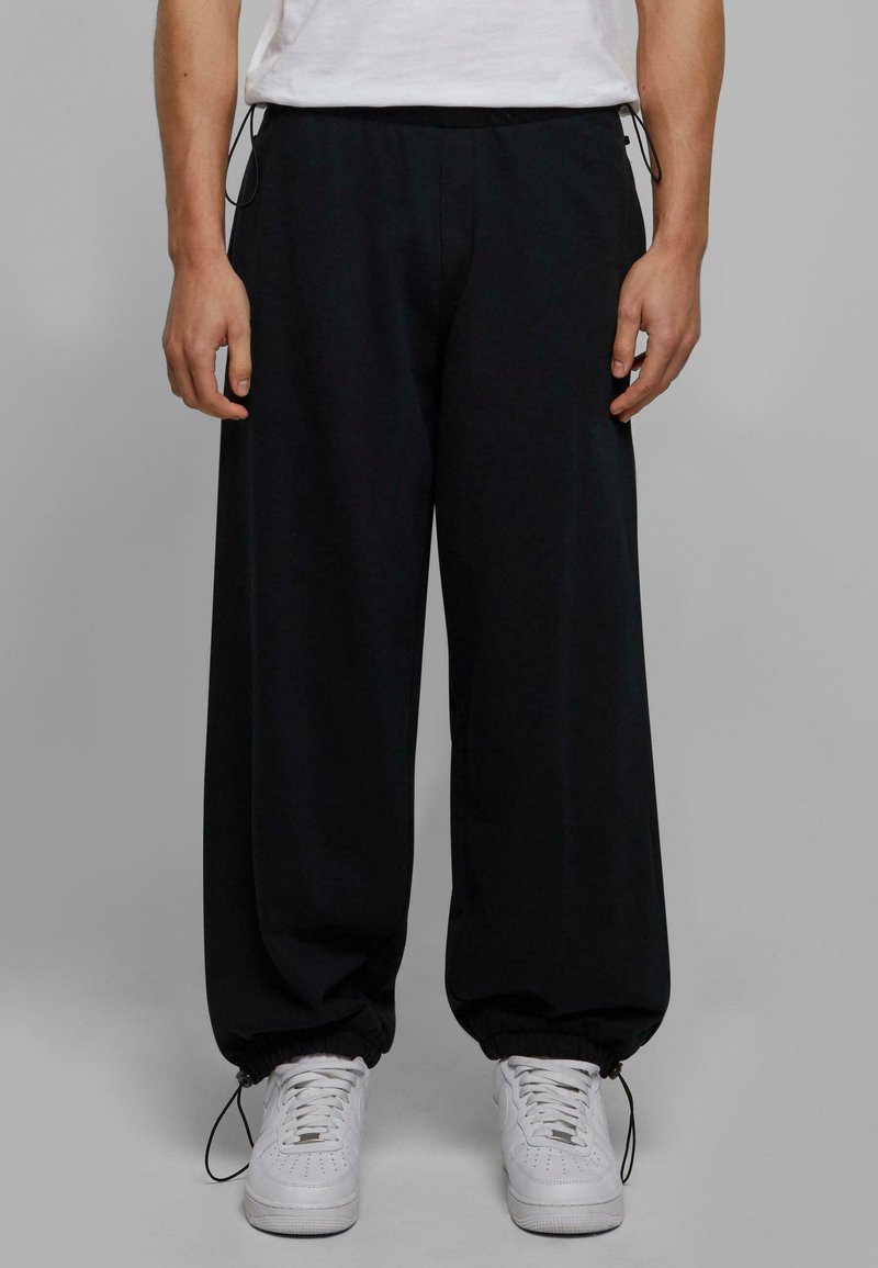 Urban Classics PARACHUTE HEAVY - Tracksuit bottoms - black - Zalando.ie