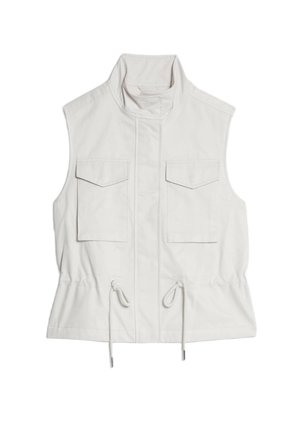 Débardeur blanc sans manches en coton, doté d'un col montant, de deux poches avant et d'une taille à cordon pour un ajustement réglable. Texture lisse.