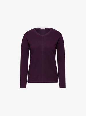 Haut à manches longues violet avec un décolleté en V, présentant un tissu texturé et de subtils rayures verticales. Conçu pour un ajustement ample et un confort optimal.
