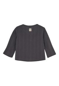 Donkergrijze lange mouwen babyshirt met ribbelstructuur, ronde halslijn en klein beige label met een glimlachend gezicht op de bovenrug.
