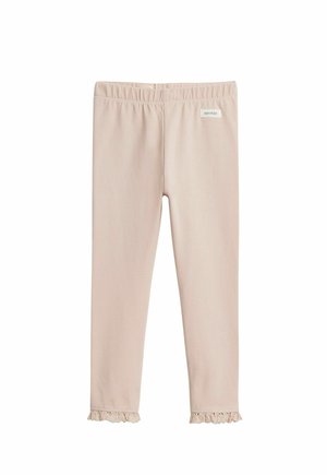 Hellbeige Leggings für Kleinkinder mit elastischem Bund, Spitzenvolant am Knöchel und kleinem "newbie"-Etikett in der Nähe des Bunds.
