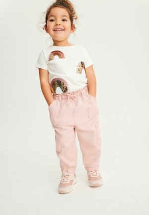 STANDARD - Trousers - pink